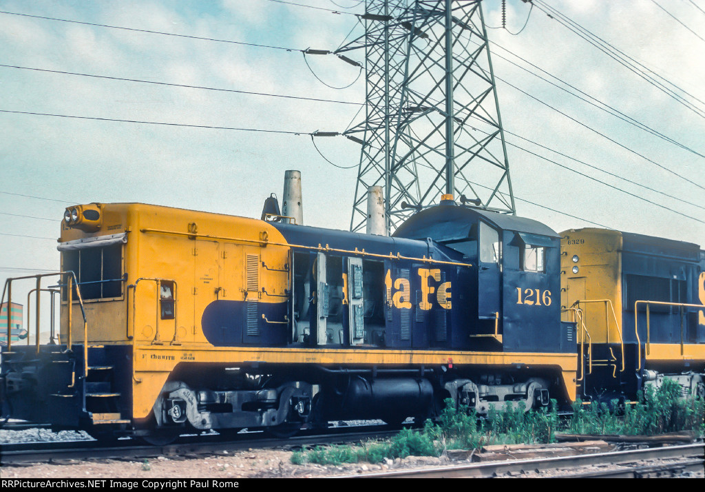 ATSF 1216, SBB1200 San Bernardino rebuild, ex ATSF EMD NW2, in dead line  